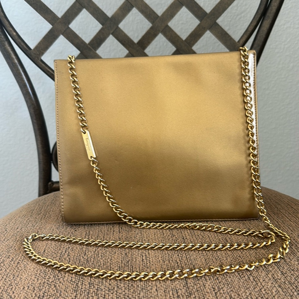 Salvatoree Ferragamo 2 way may gold evening bag.